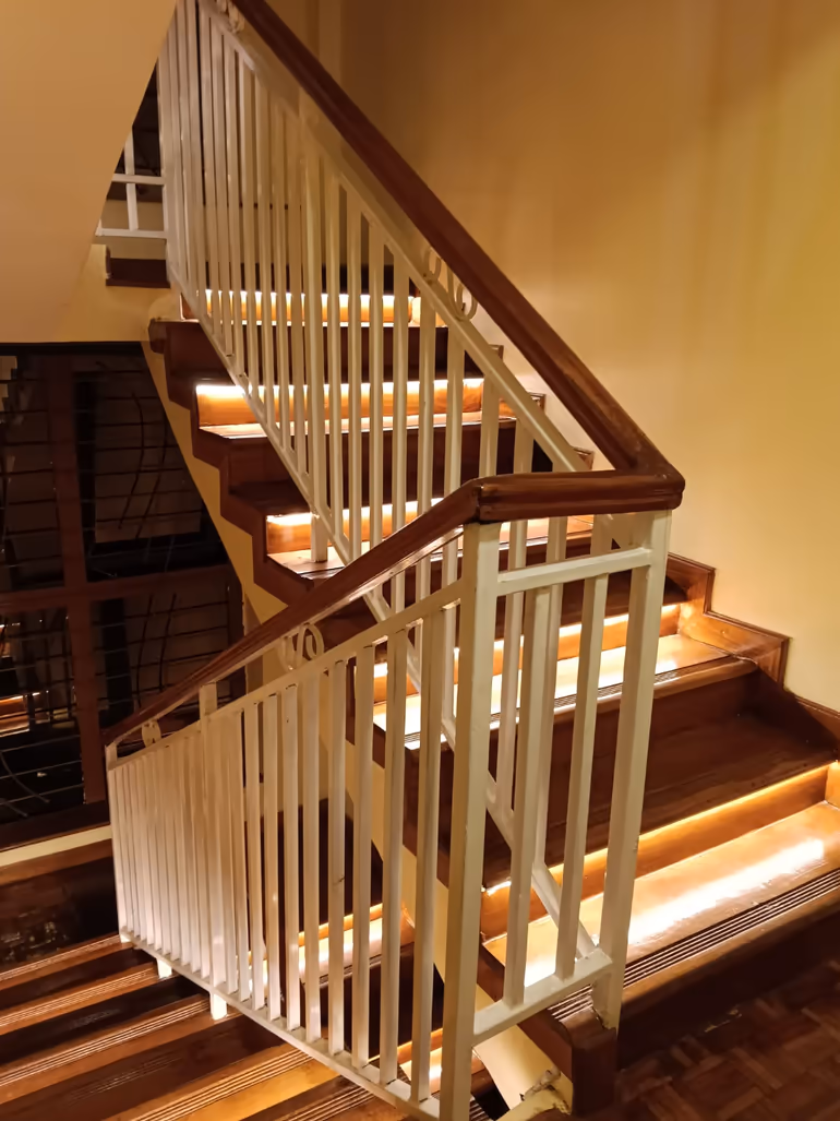 Deeply cleaned wooden staircase with polished railings in a Kiambu home